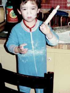 Even as a toddler, he enjoyed rolling dough.